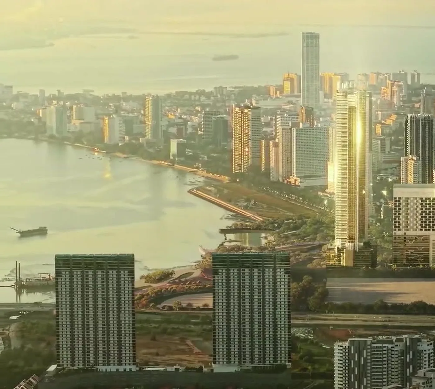The tower rising above Gurney Bay and the George Town skyline at golden hour